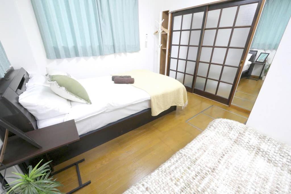 マスク配布ありa5 新宿10分 10人宿泊可能 出張在宅勤務に最適!!宿泊型テレワークスペース!!Wifi完備 回線安定してます!!長期宿泊受付中 Tokyo prefektur Exteriör bild